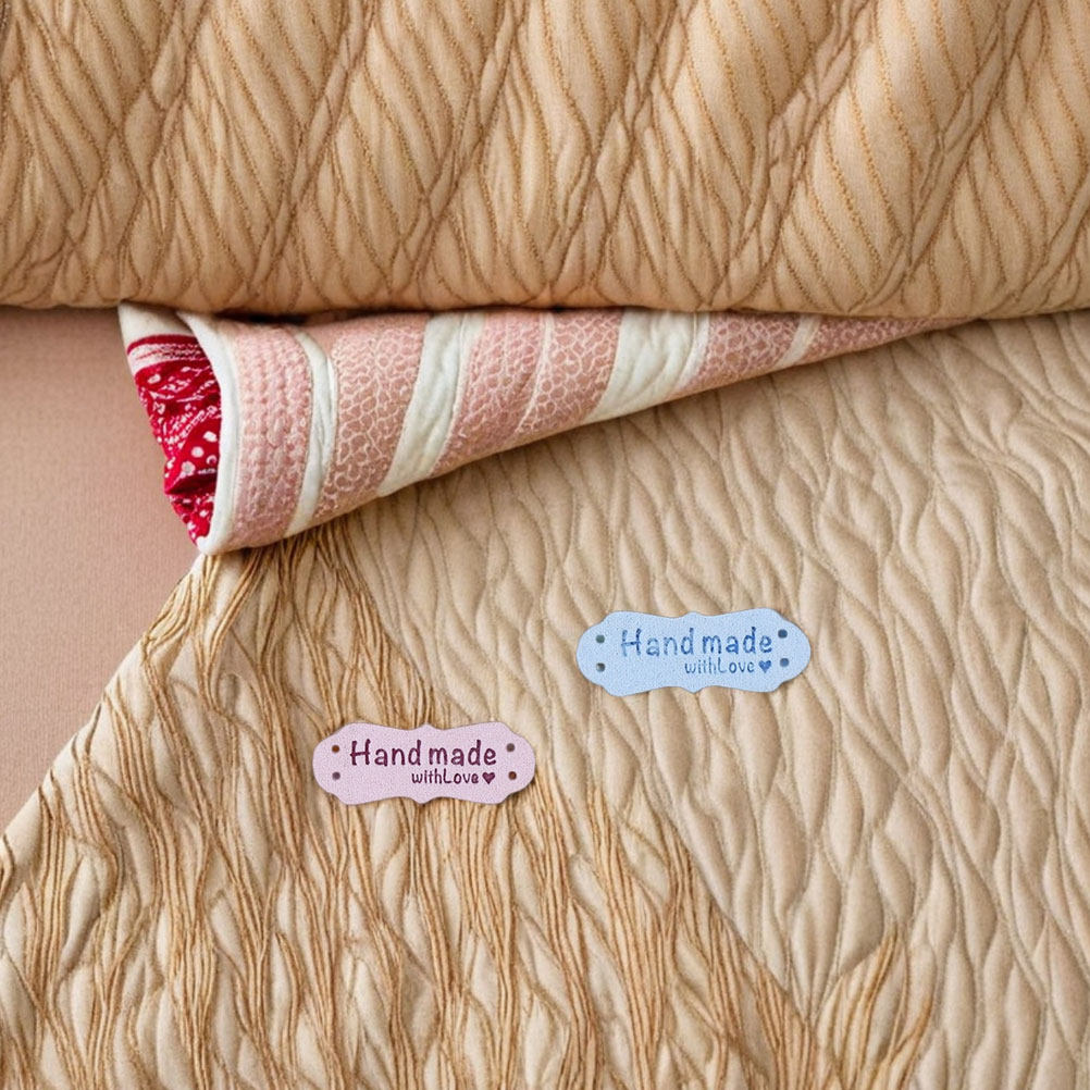 Sewing Labels - 100Pcs Handmade Embossed Suede Labels Two
